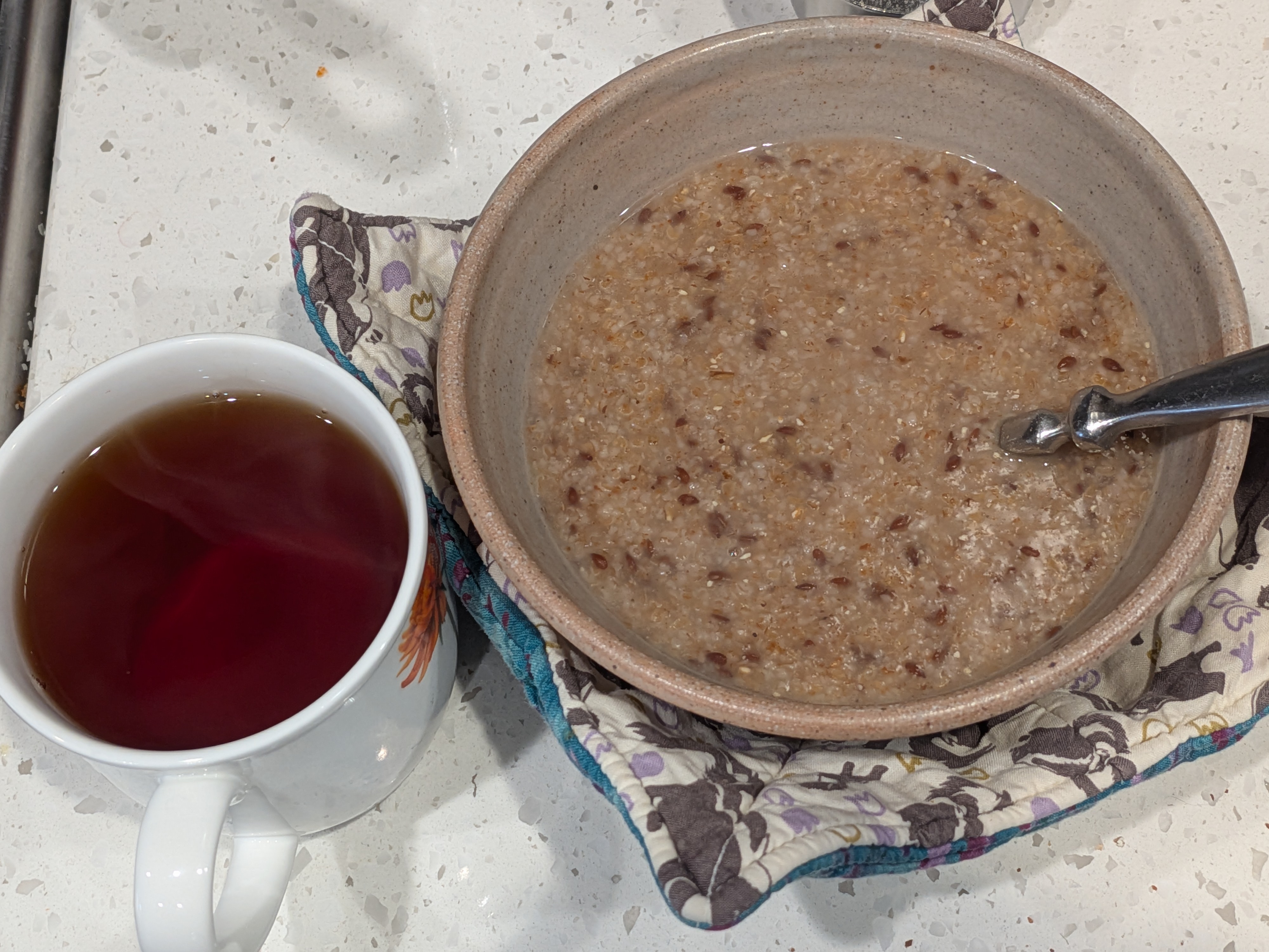 Bowl of Red River Cereal and a cup of tea